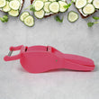 Multicolor 2-in-1 vegetable cutter and peeler for kitchen preparation.
