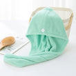 Microfiber hair drying towel wrap showing its fast drying ability