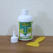 Close view of wall crack repair cream applied to a wall surface.